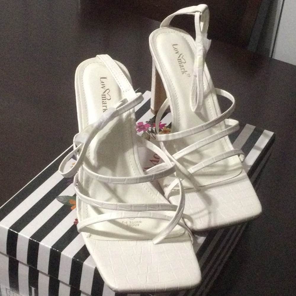 Lov high heals shoes , white new never used